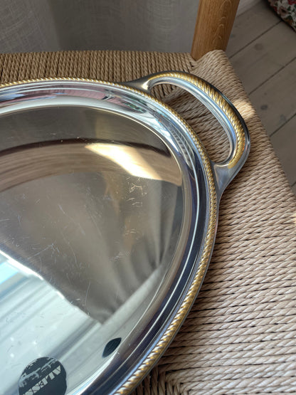 Alessi steel dish with twisted gold edge