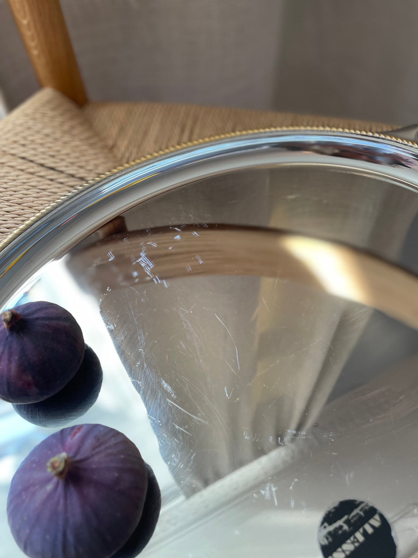 Alessi steel dish with twisted gold edge