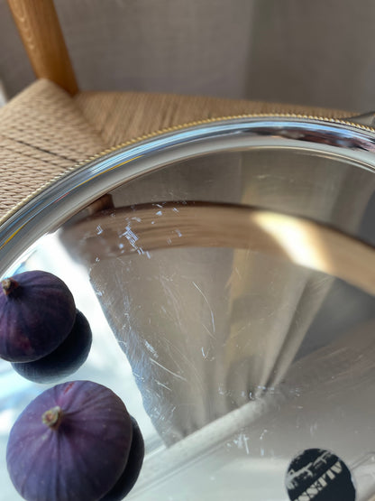 Alessi steel dish with twisted gold edge