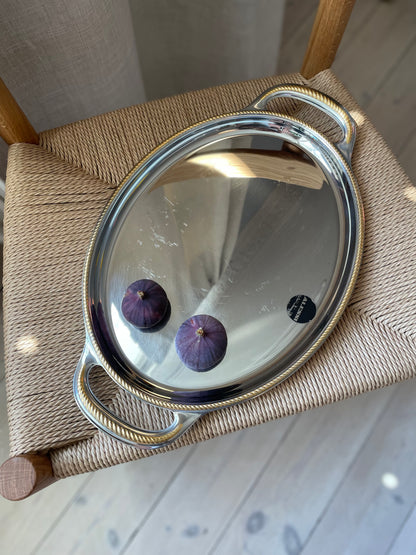 Alessi steel dish with twisted gold edge