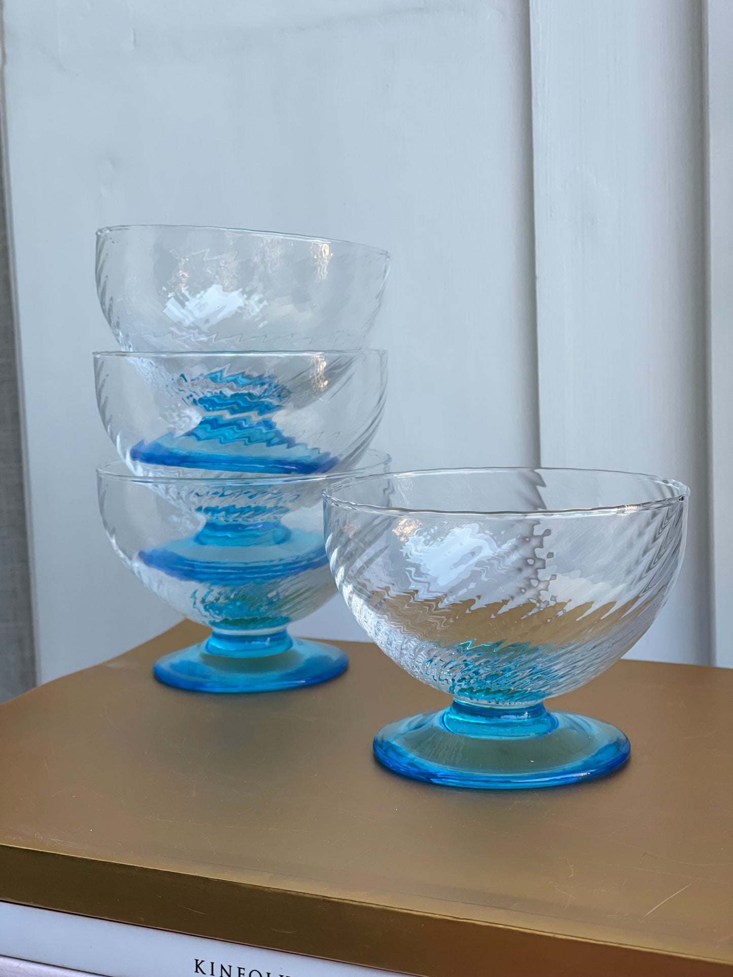 Italian coupes with swirl and blue feet