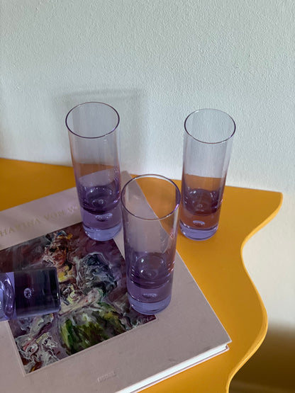4 Tall purple glasses with bobble in the base
