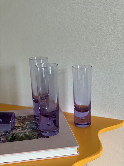 4 Tall purple glasses with bobble in the base